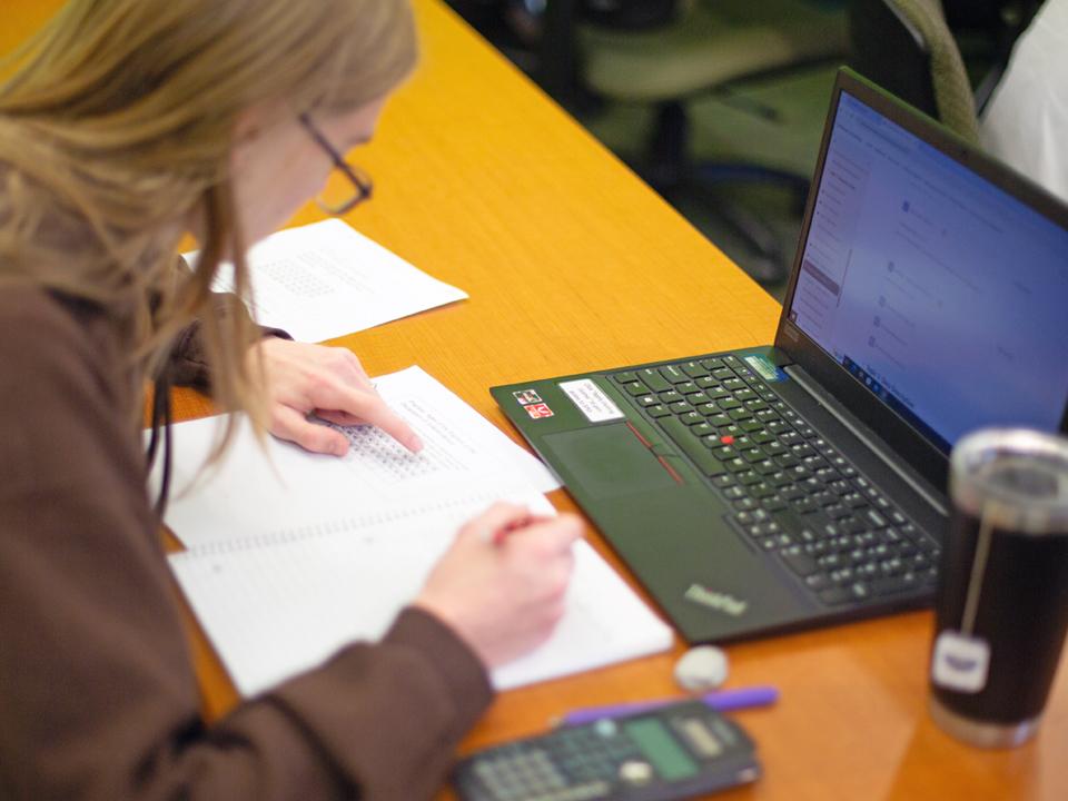 Student reviewing college financial aid package