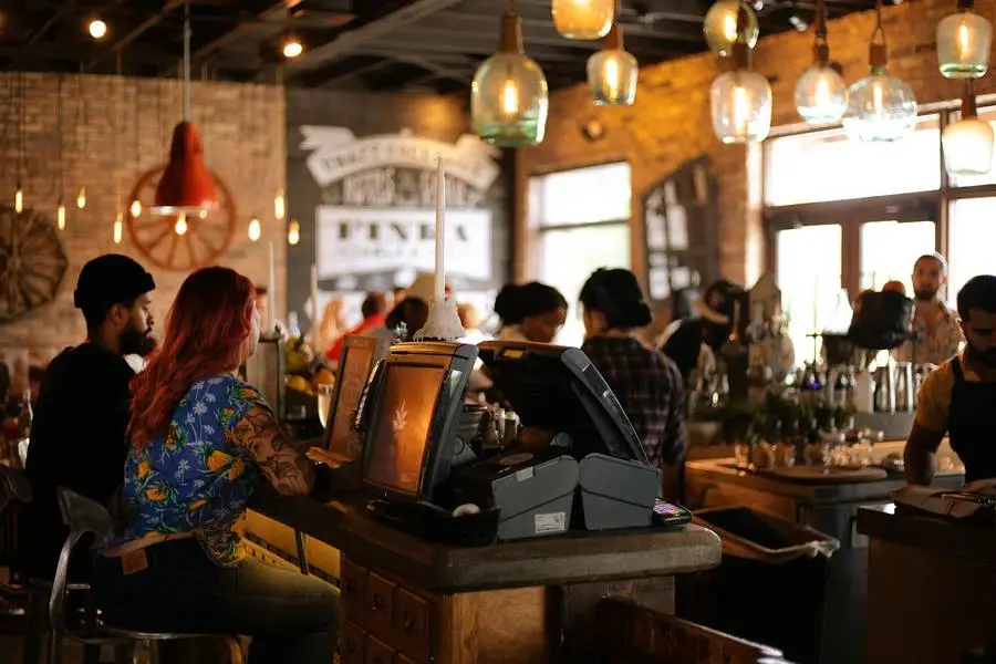 People enjoying a busy local venue