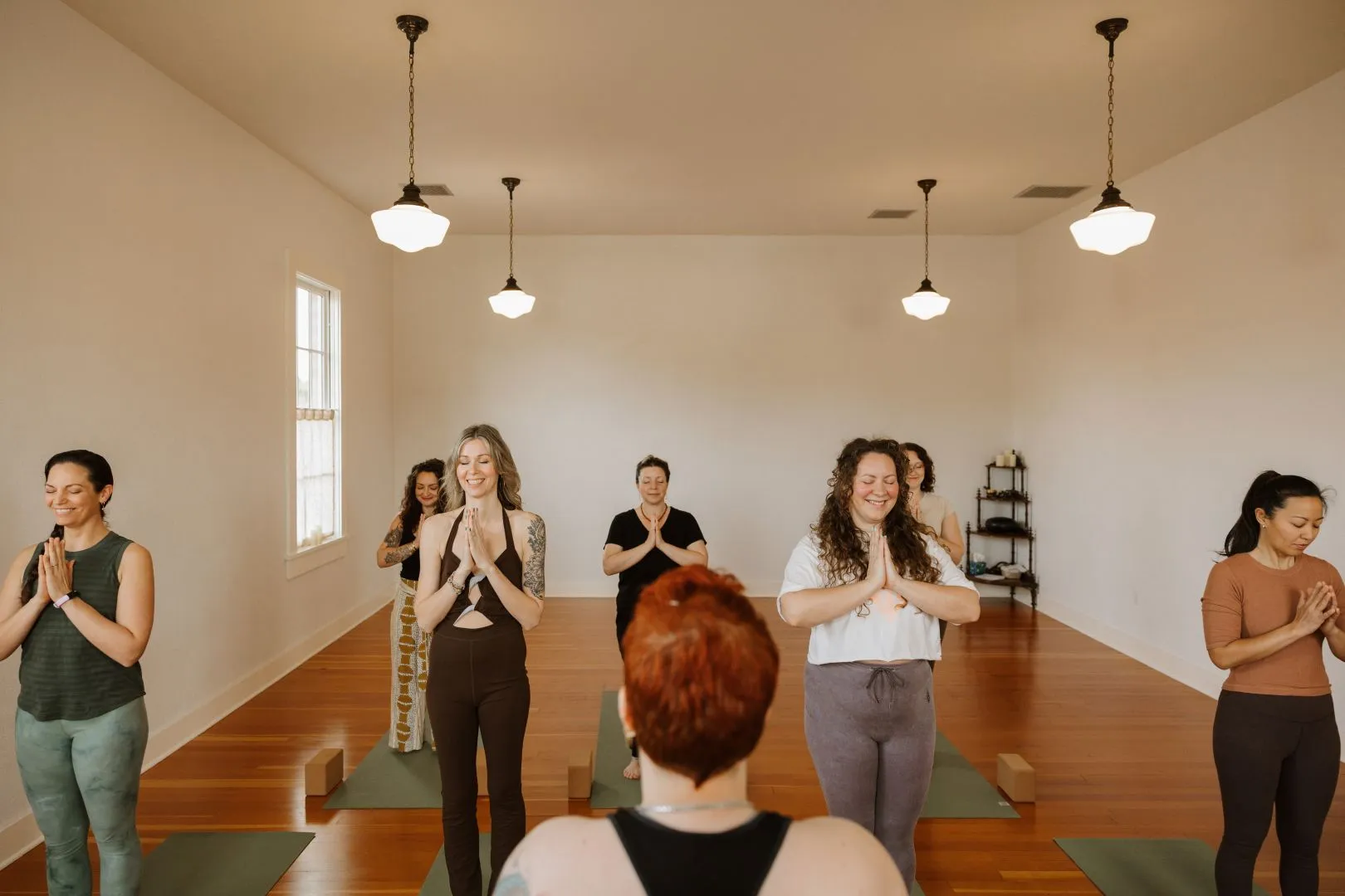 Students in class at Unfurl Yoga