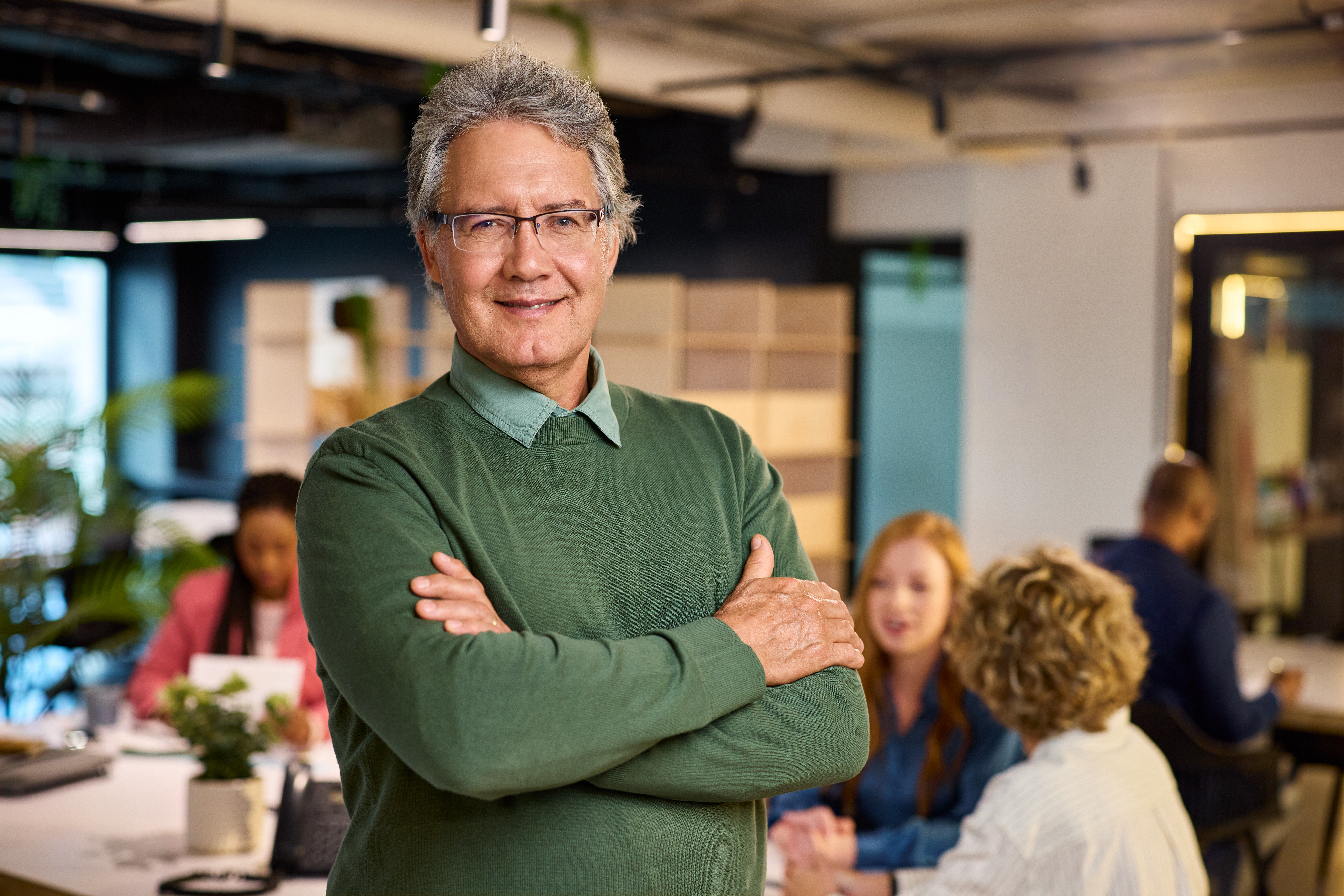 Confident mission-driven leader in a professional environment