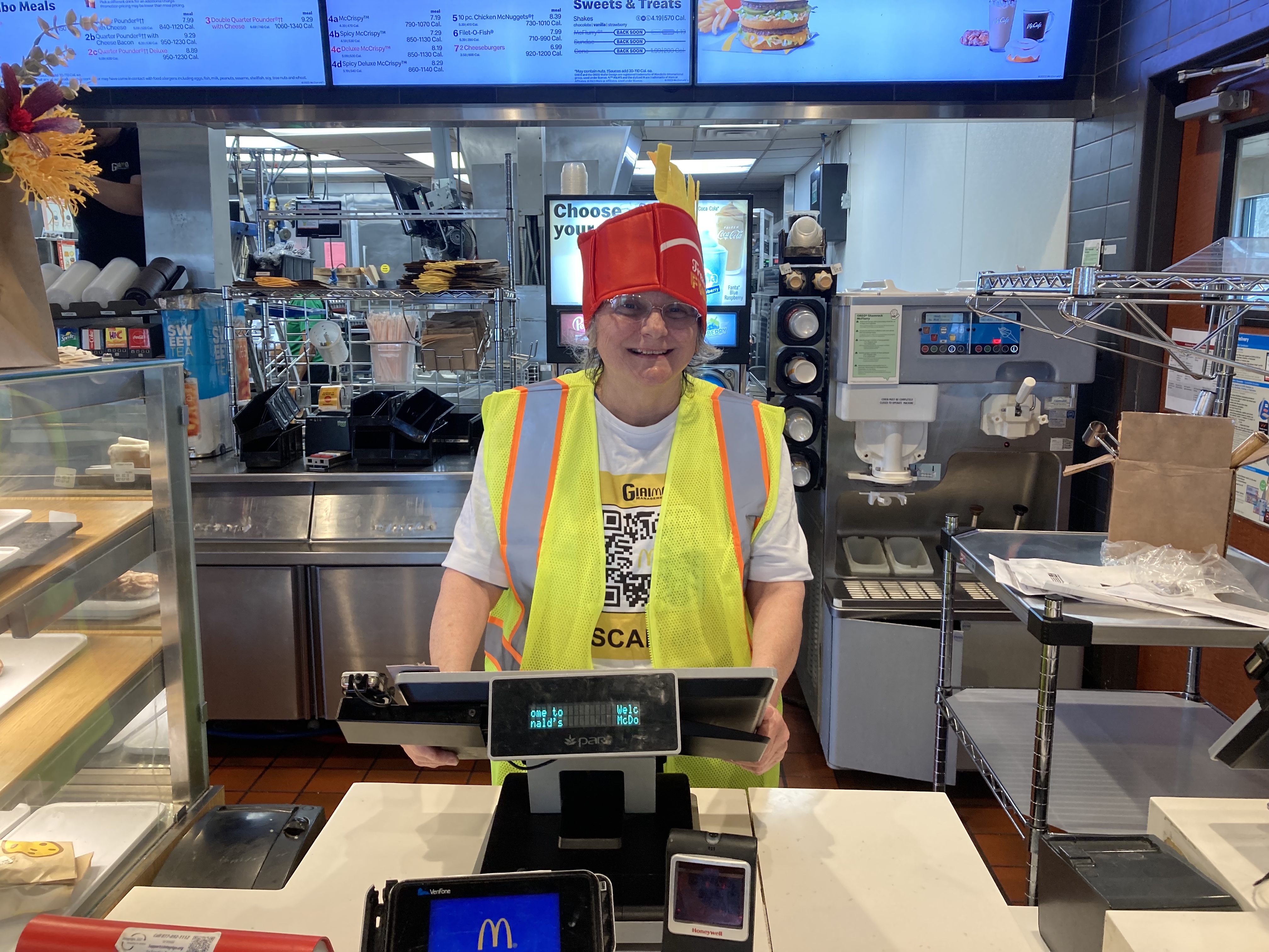 Giaimo Management employee wearing QR activation shirt