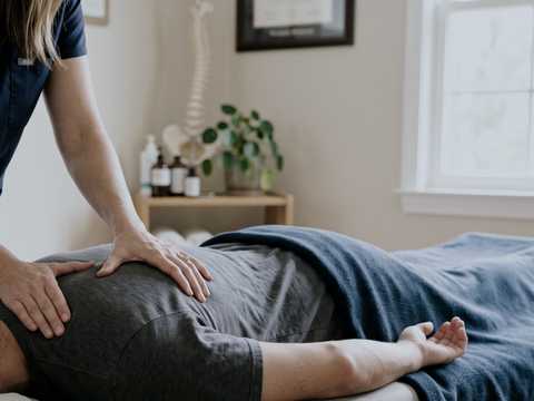 Chiropractor treating a patient in an independent clinic