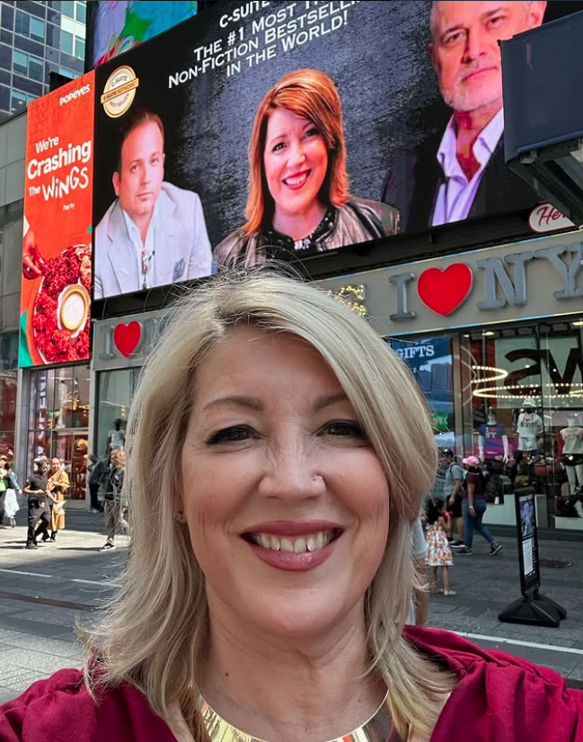 The Leader's Playbook featured on a Times Square billboard