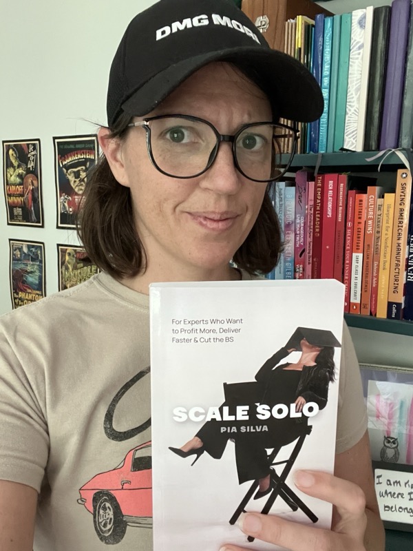 Reader holding Scale Solo
