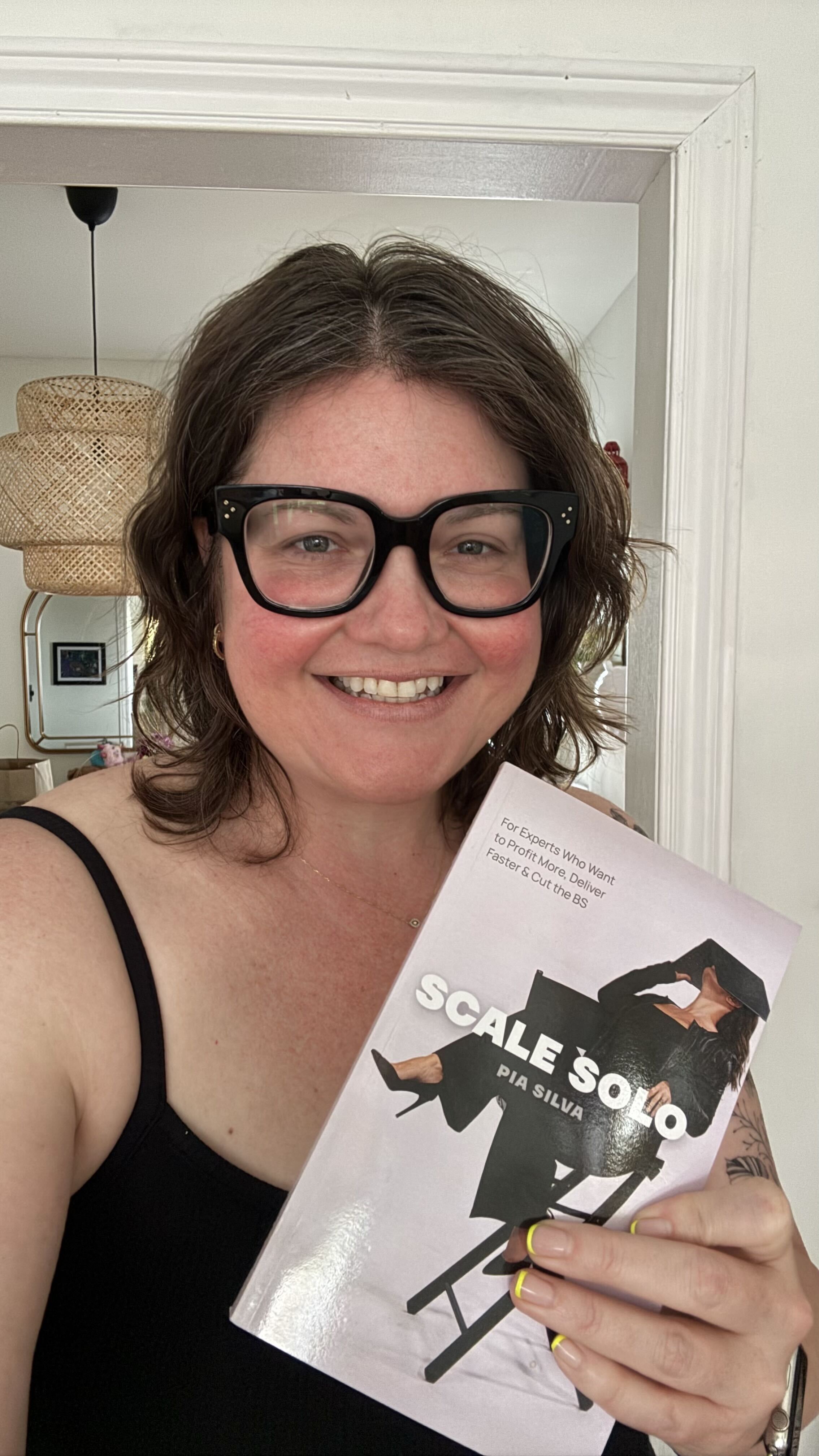 Reader holding Scale Solo