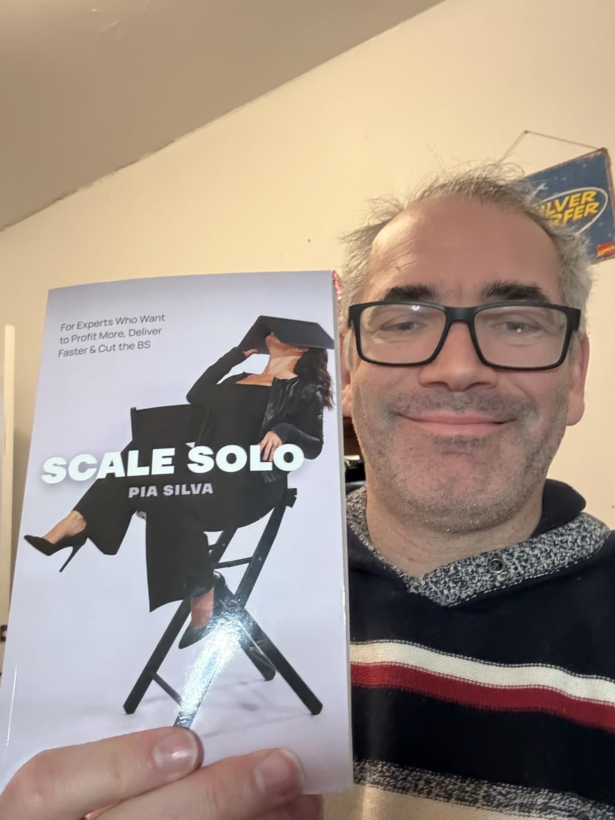 Reader holding Scale Solo
