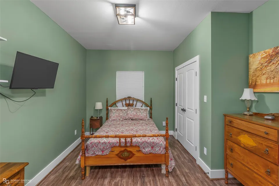 Guest bedroom with green walls