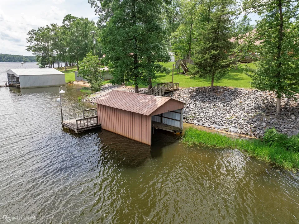 Boathouse, dock and shoreline seen from above