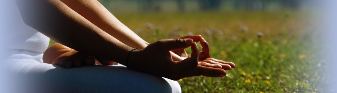 pilates vs yoga - woman on a mat in a controlled movement pose