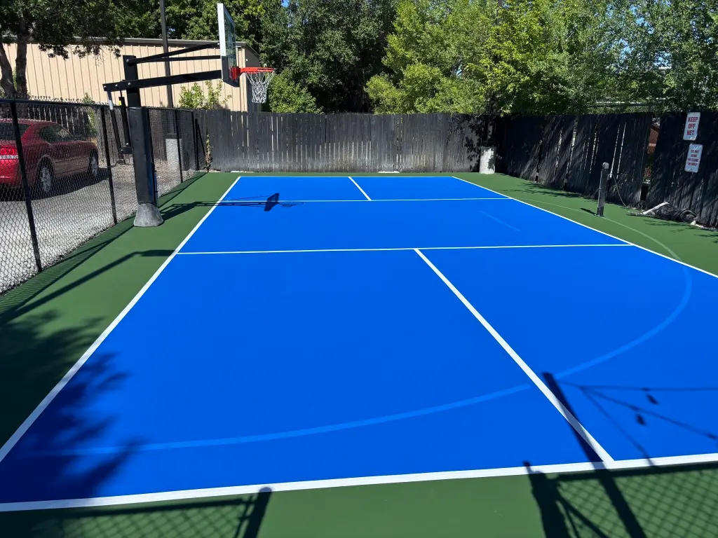 painting pickleball lines on a basketball court