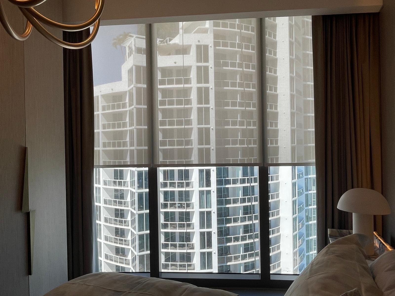 Layered drapery with city views