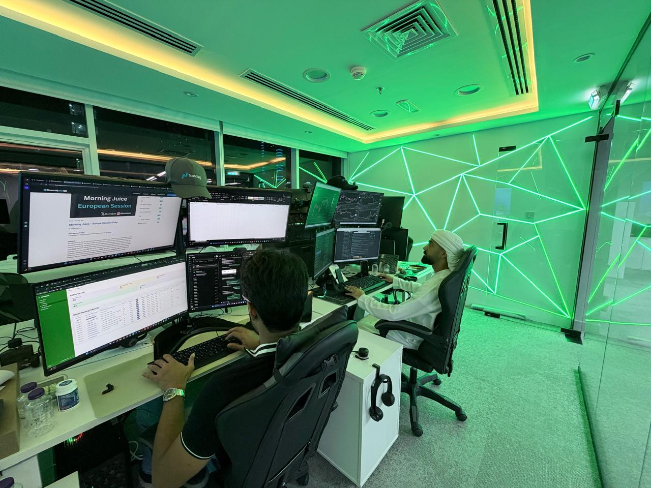Traders at their desks on the FMO trading floor in JLT, Dubai