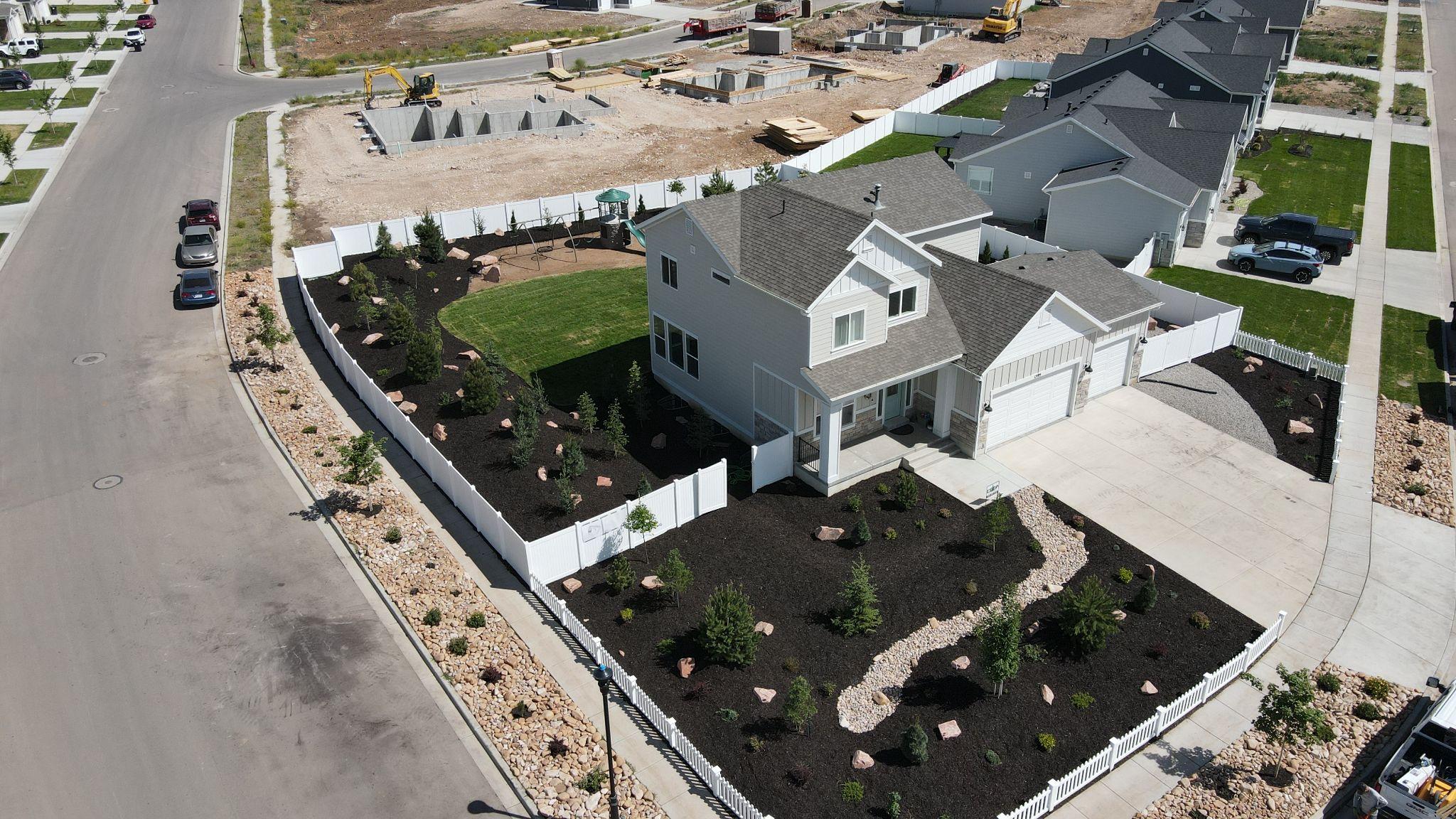 Aerial view of finished front yard