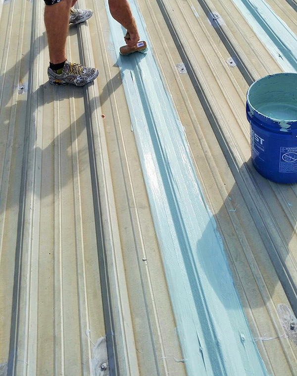 Coating applied over a metal roof