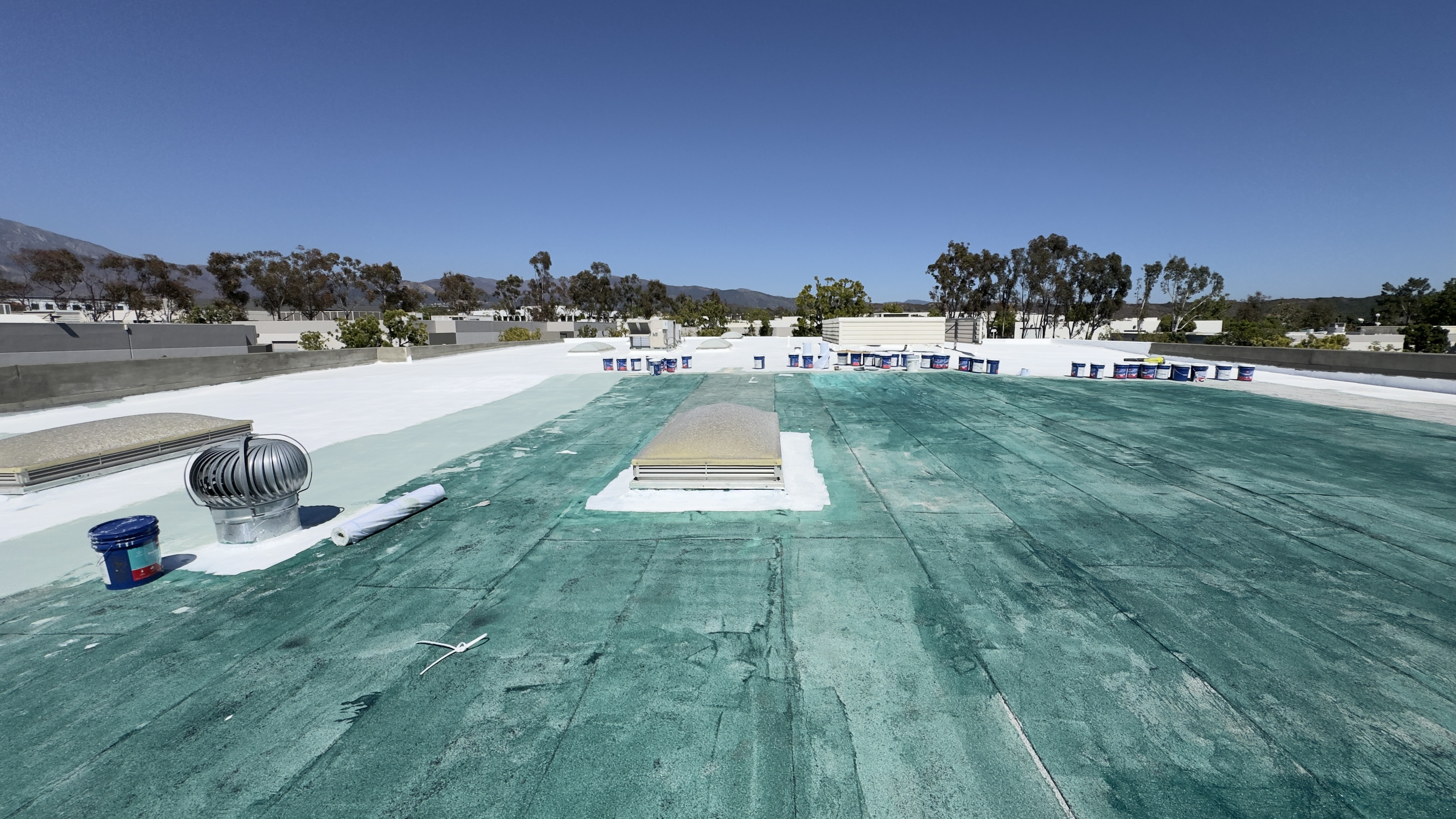 Primed roof with skylight curb