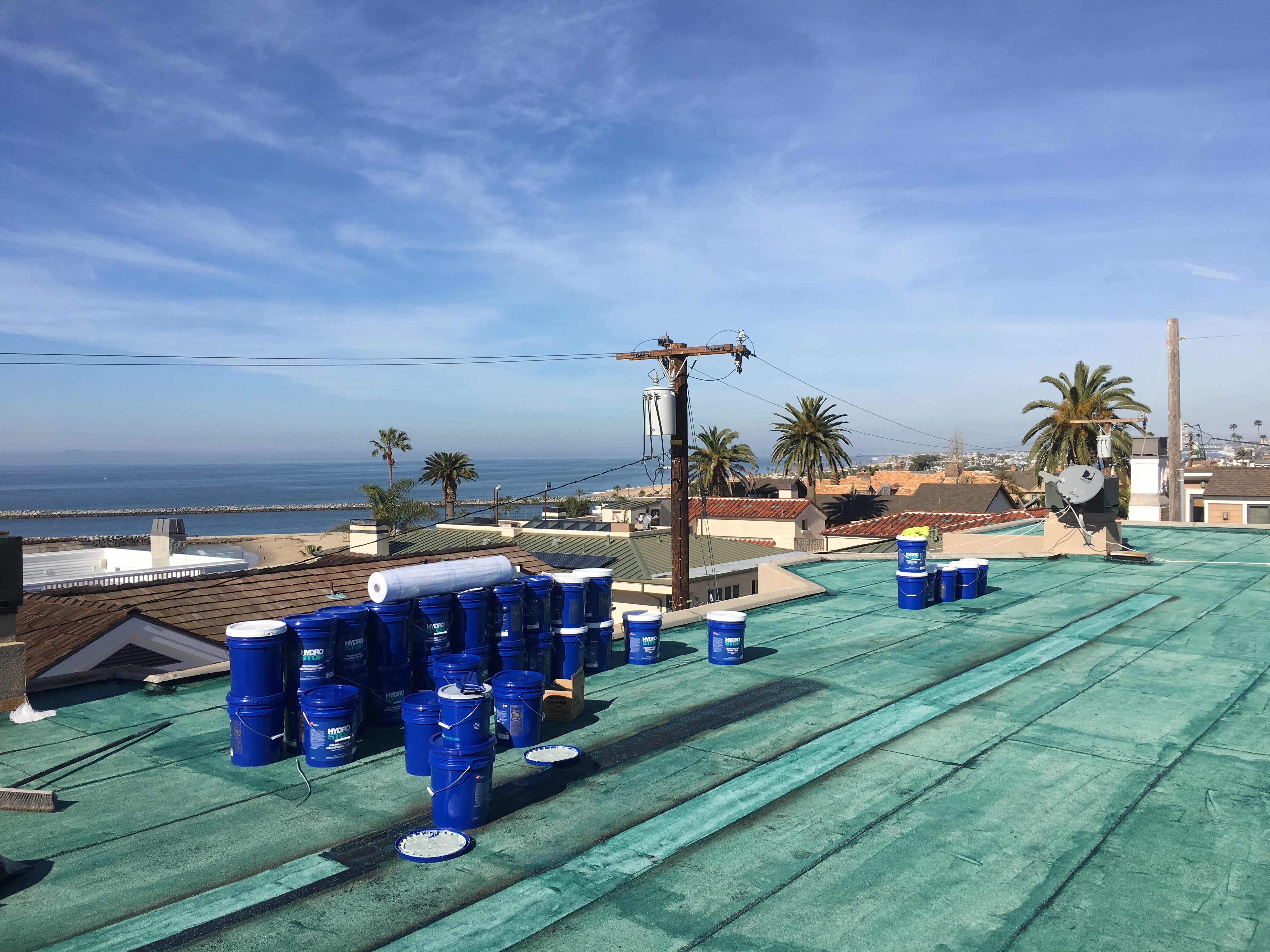 Roof coating primers and accessories