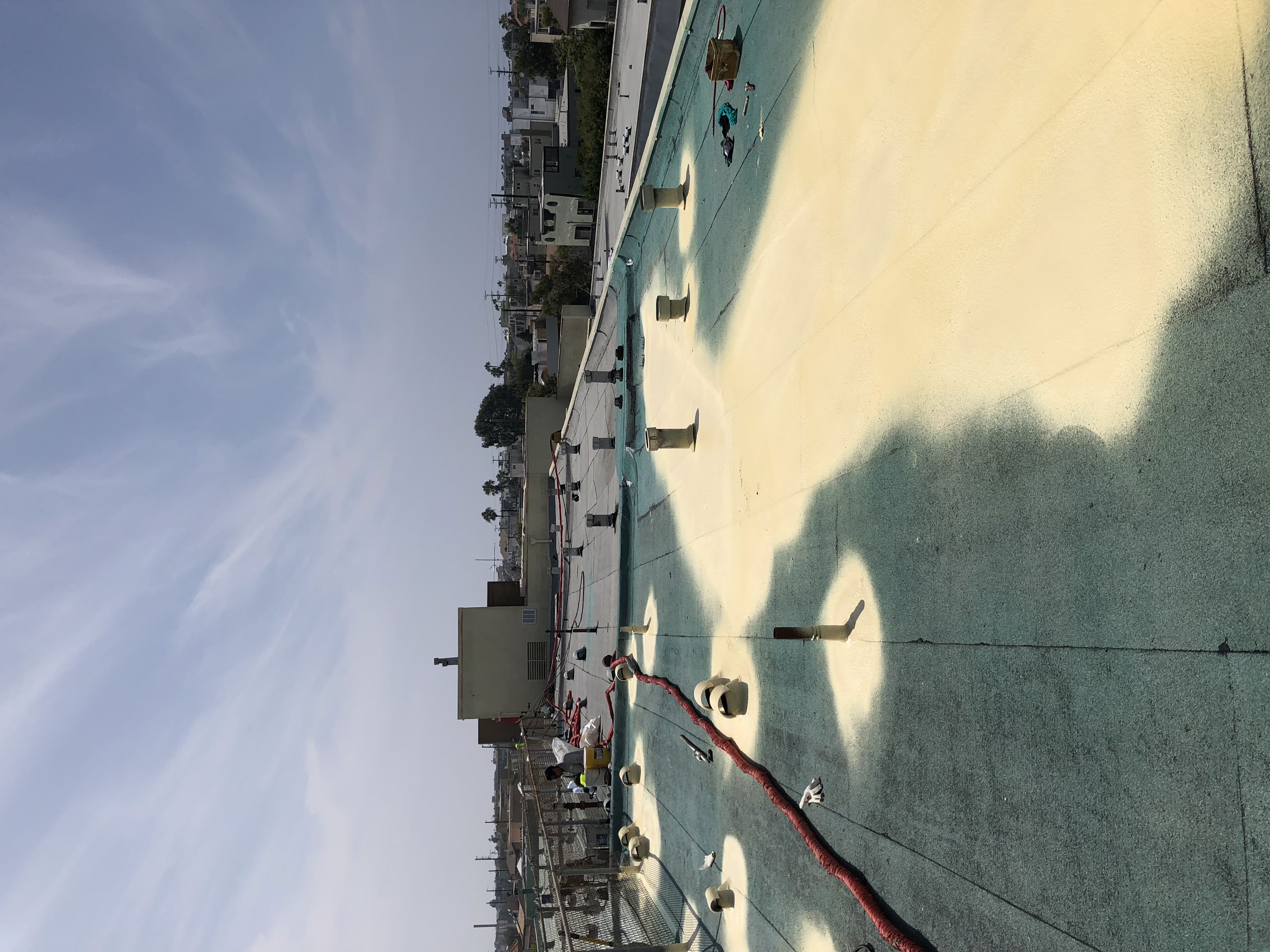 Commercial roof coating on a retail mall