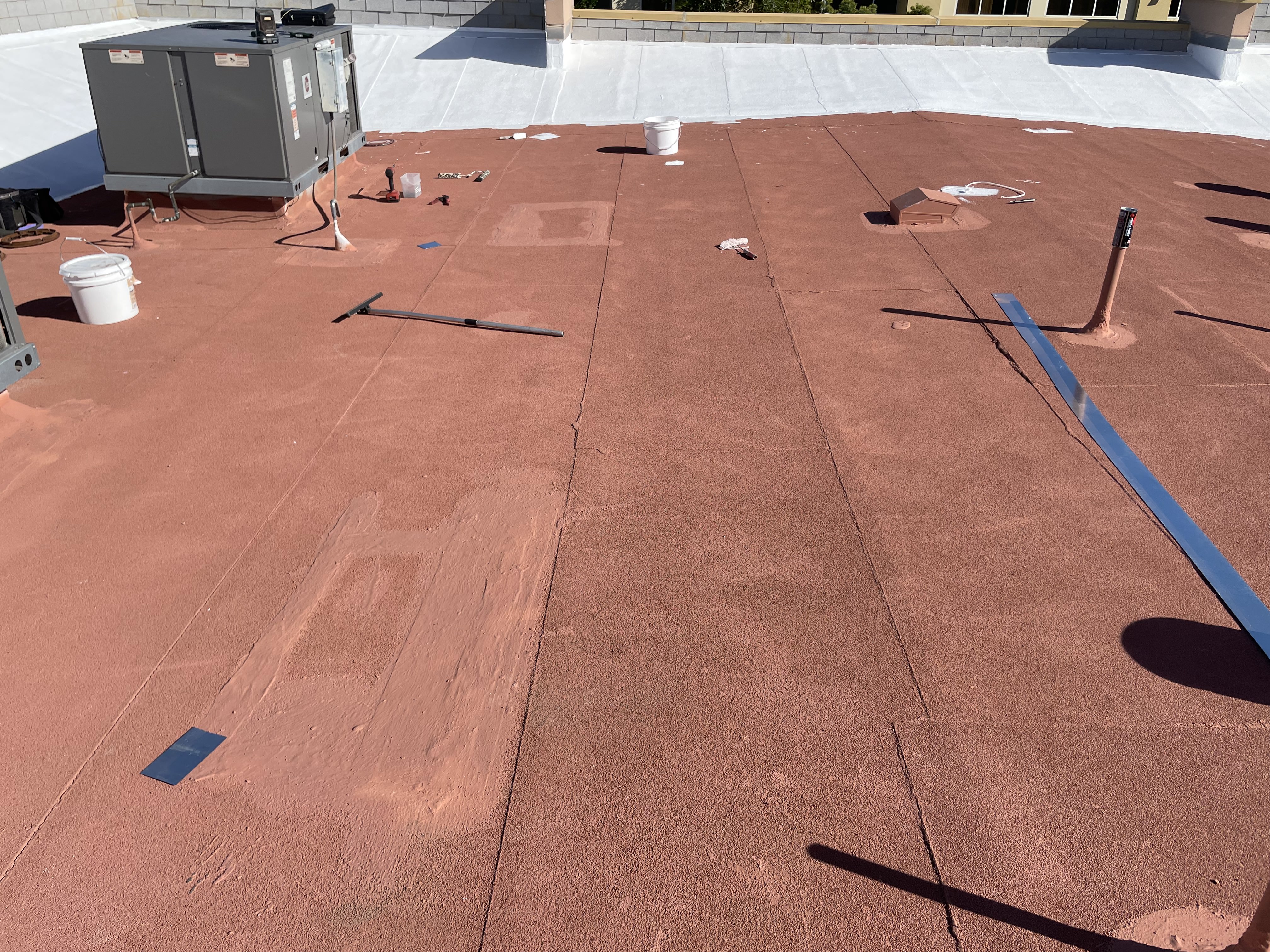 Granulated asphaltic roof surface