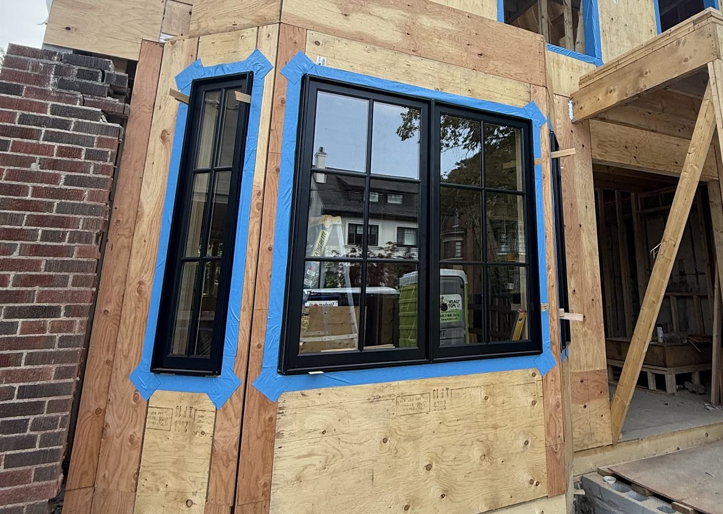 A BVM home addition under construction in Toronto, with new windows going in