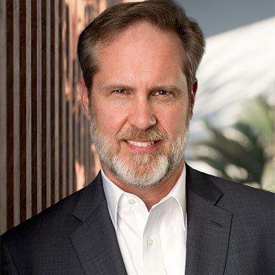 Headshot of male executive wearing a sharp suit in Charleston SC