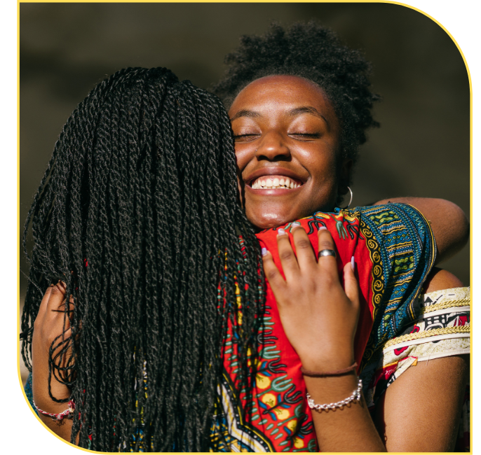 Two women hugging, emotional support