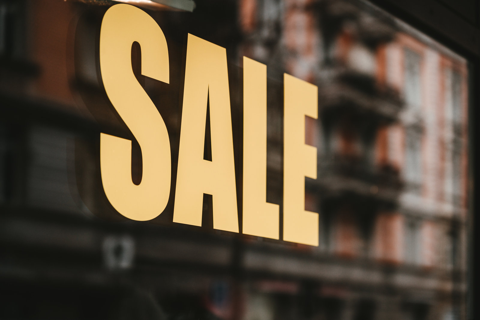 Sale sign printed on window