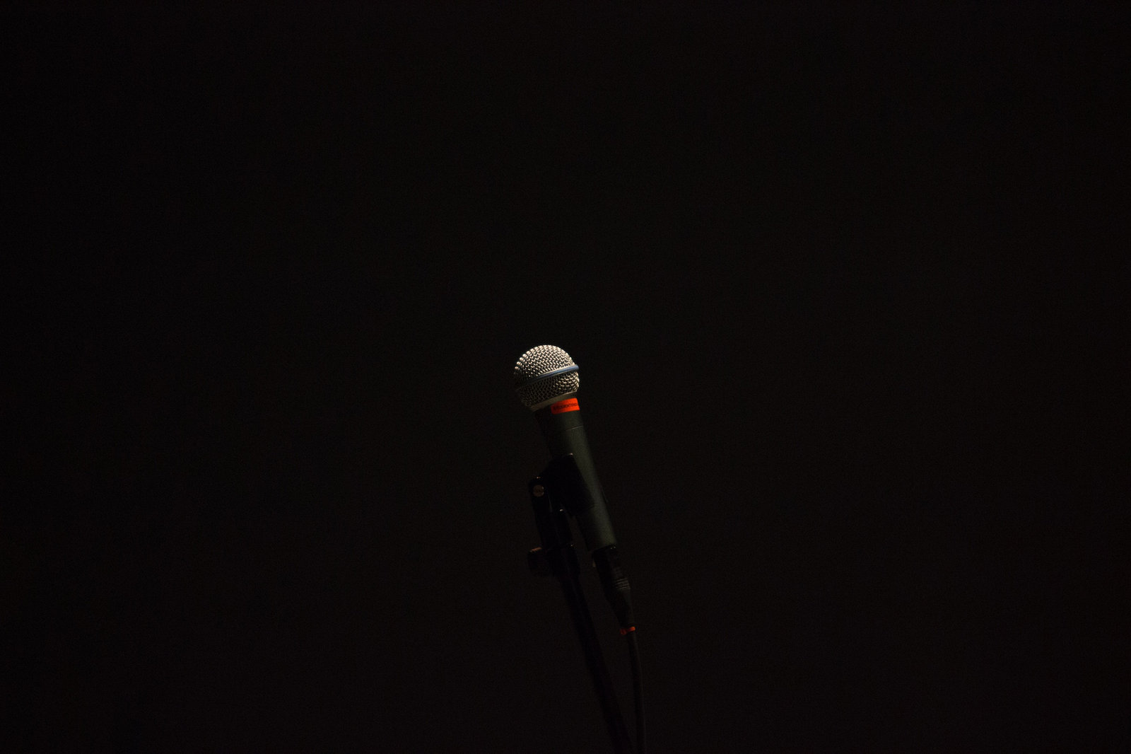 microphone against black backdrop