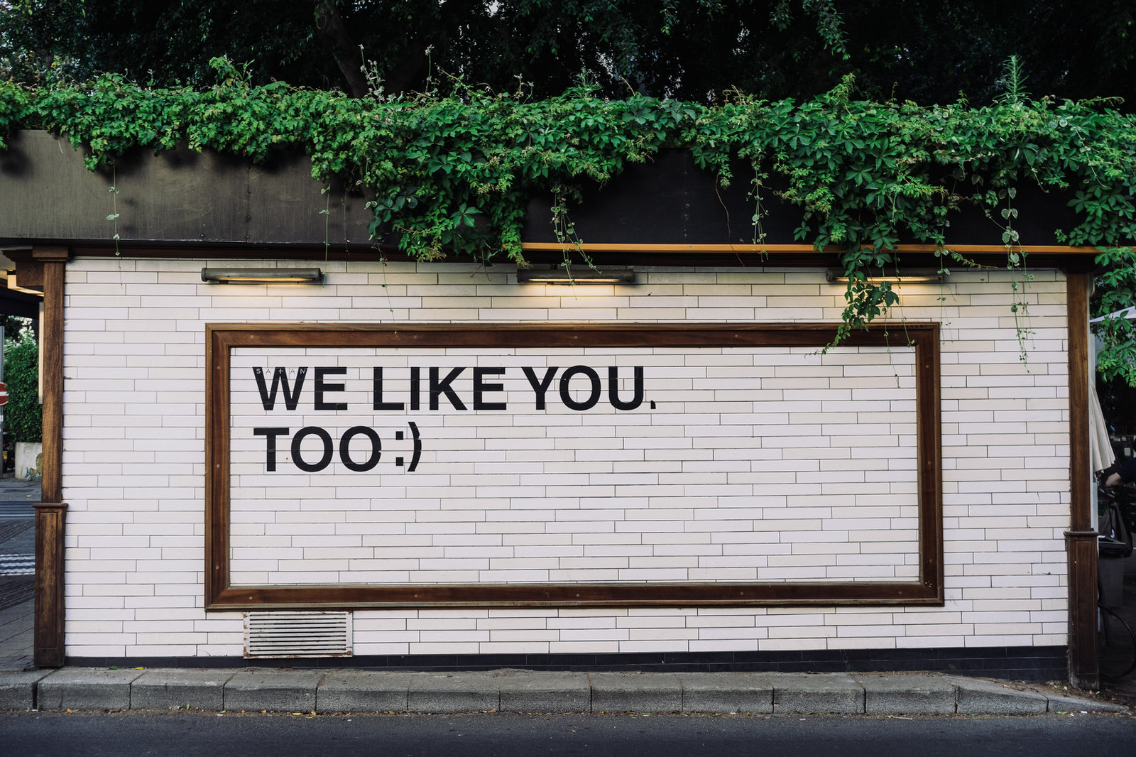 sign which says "we like you, too"