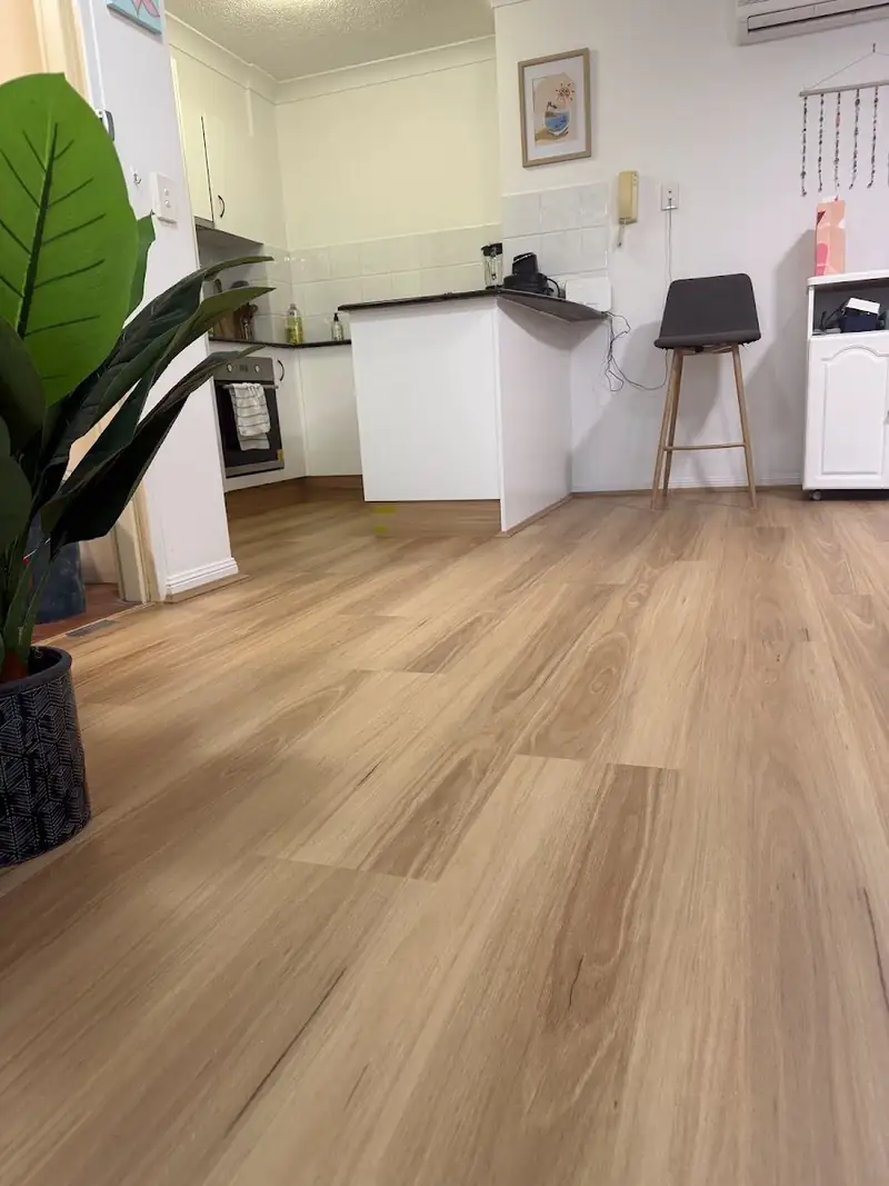 SPC hybrid flooring in a kitchen and dining area