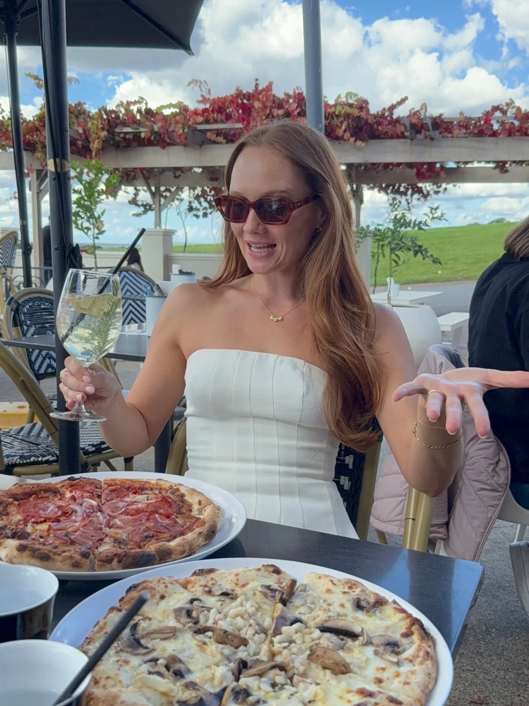 Woman eating lots of pizza