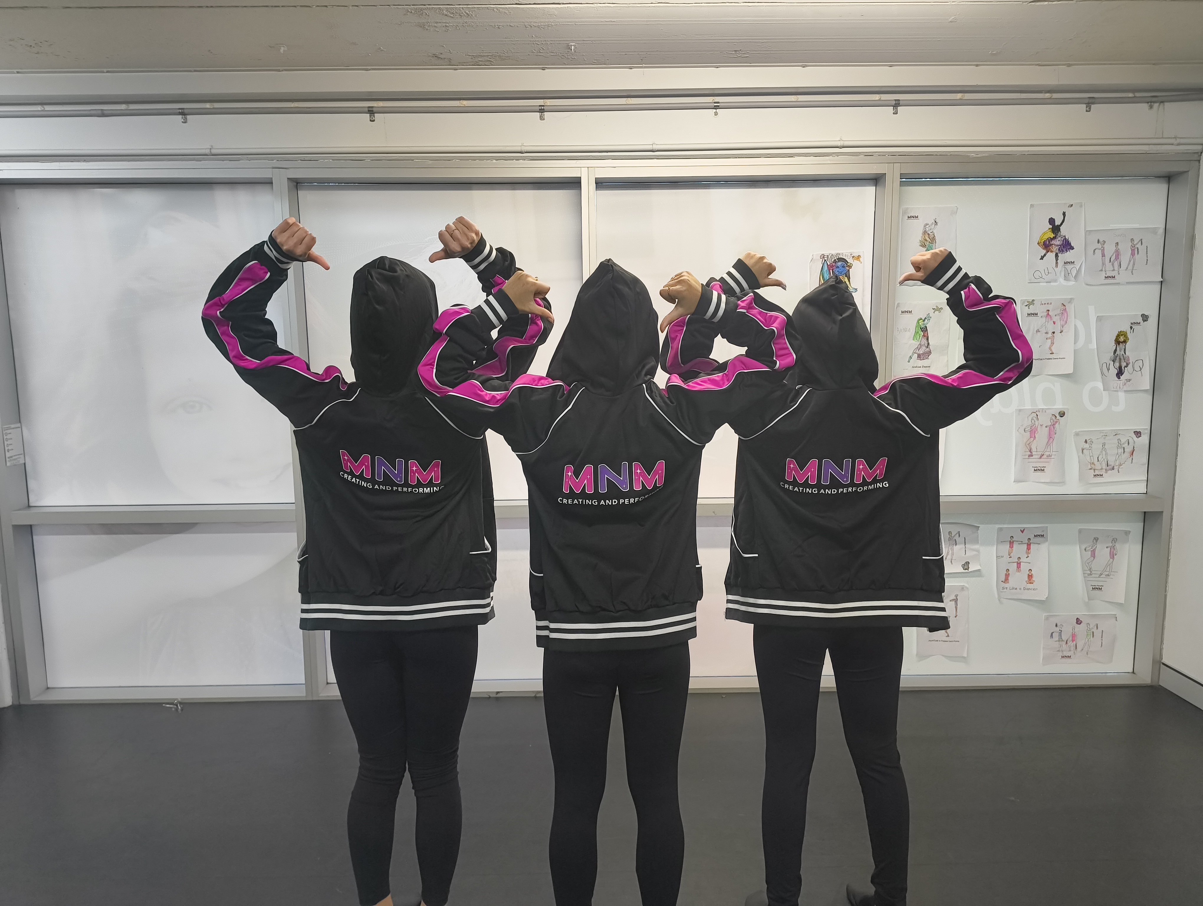 Primary-aged dancers in MNM Creating and Performing jackets, Hills District dance classes