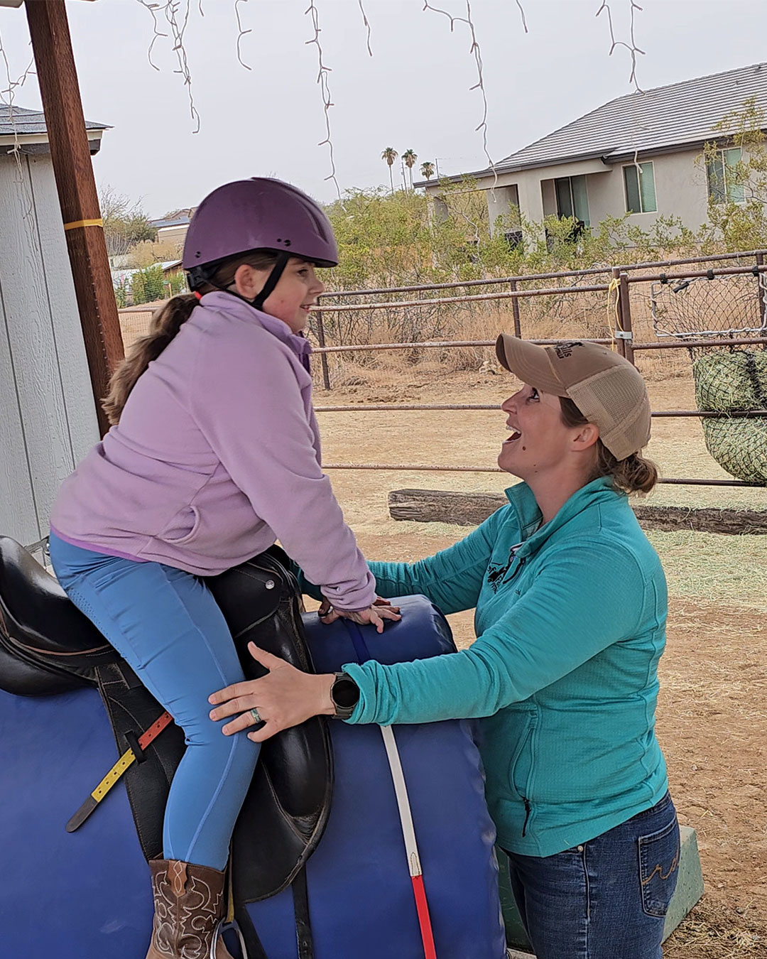 Saebra Pipoly working with a student on the buck barrel