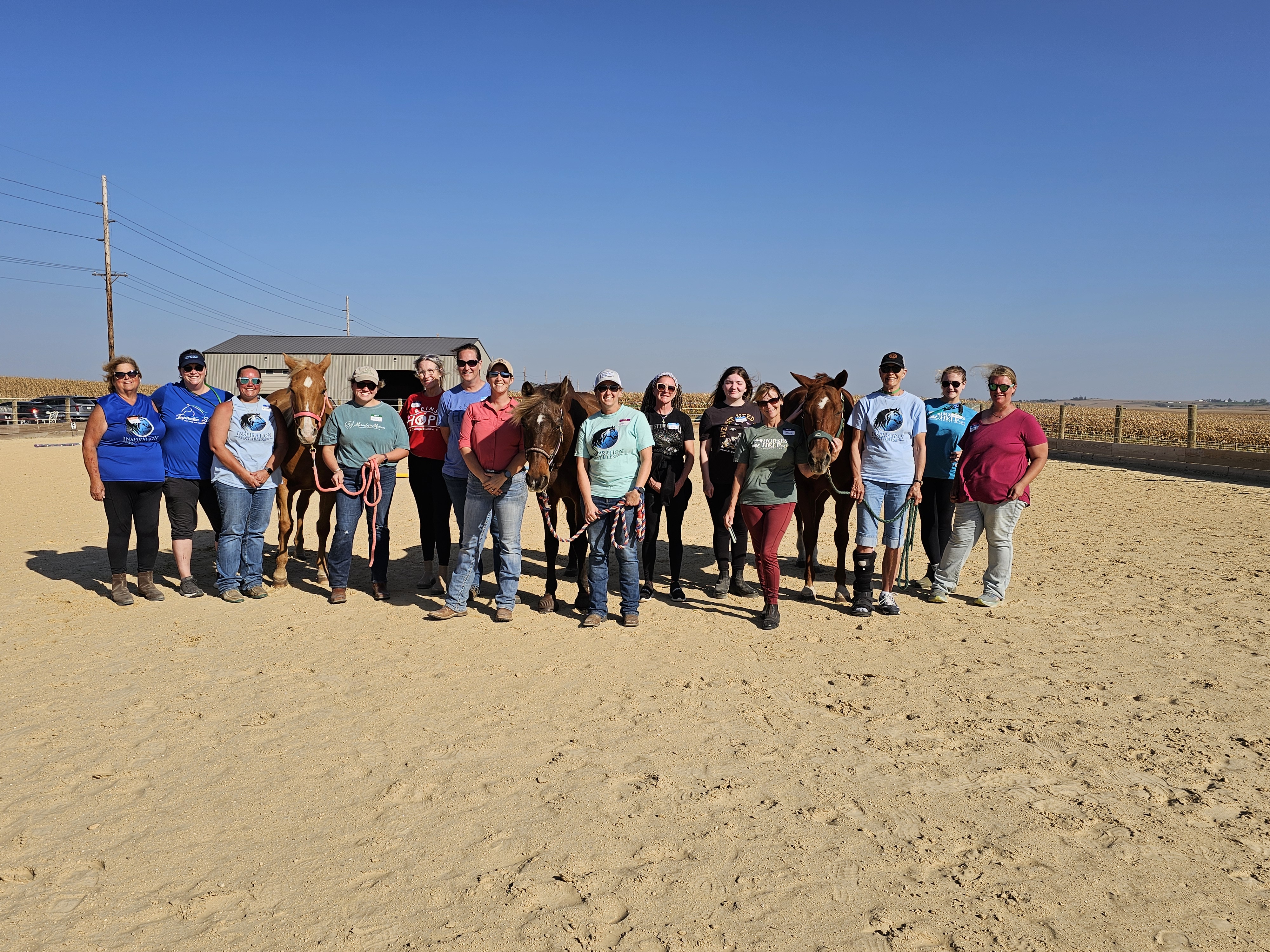 A Hoof Falls and Footfalls clinic group gathered with their horses