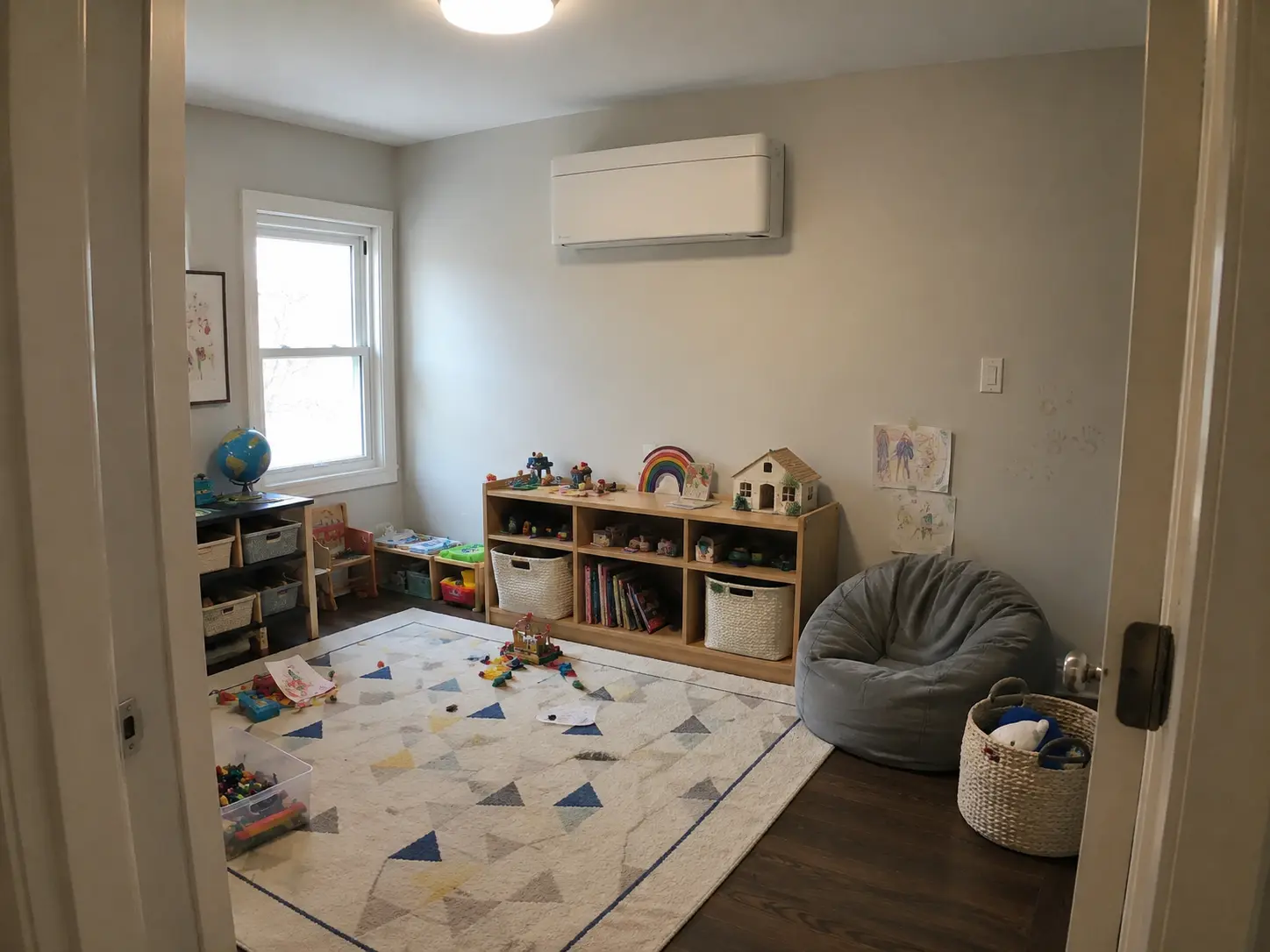 A wall unit fitted above the storage in a child's playroom