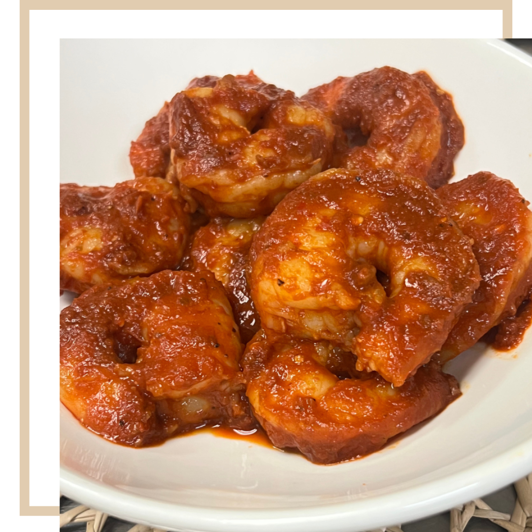 Diablo Shrimp - Spicy sautéed shrimp in a fiery red chili sauce, served over a bed of rice