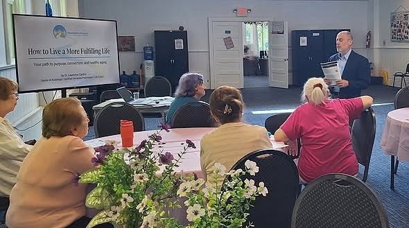 Dr. Lawrence Cardano presenting to an adult audience