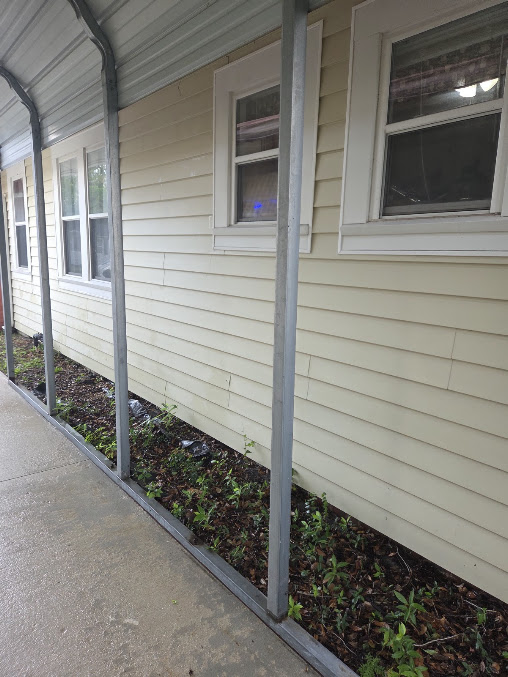 Freshly pressure-washed driveway in Nassau County