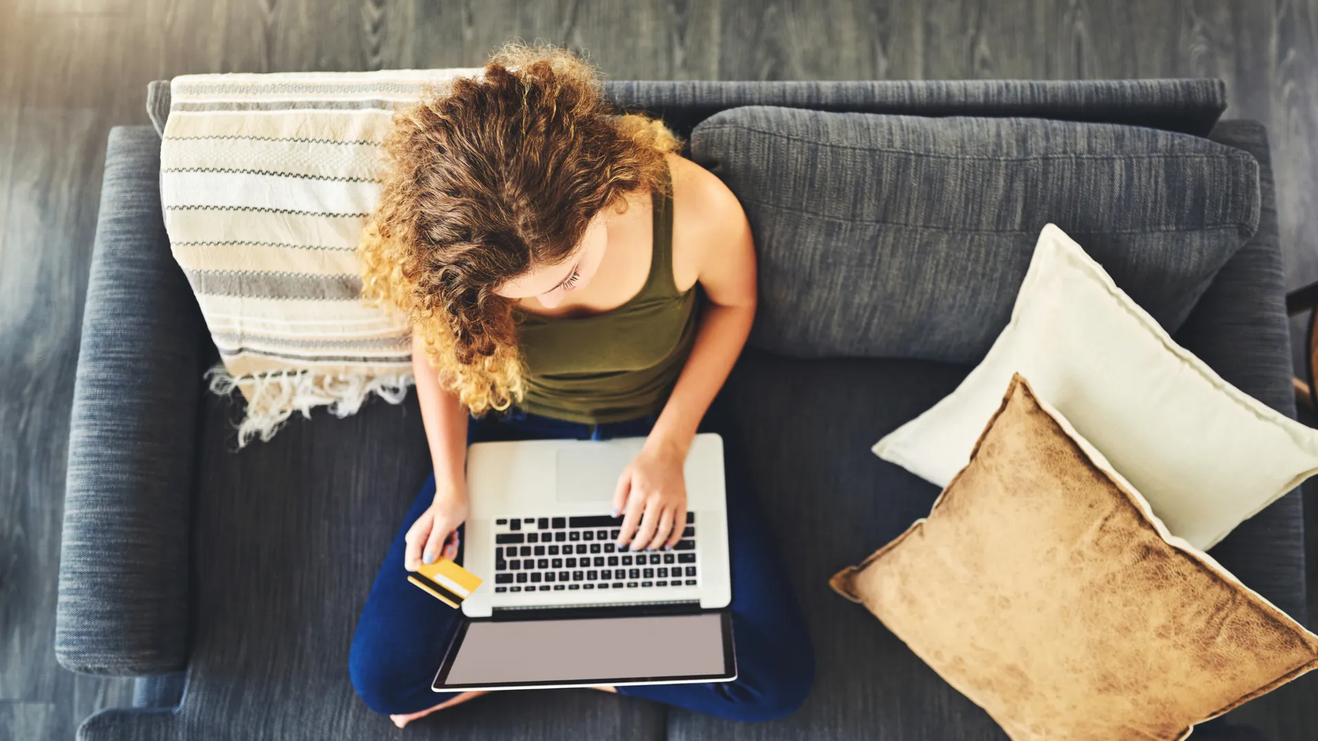 Woman attending an online therapy session from home, showing the comfort of telehealth services.