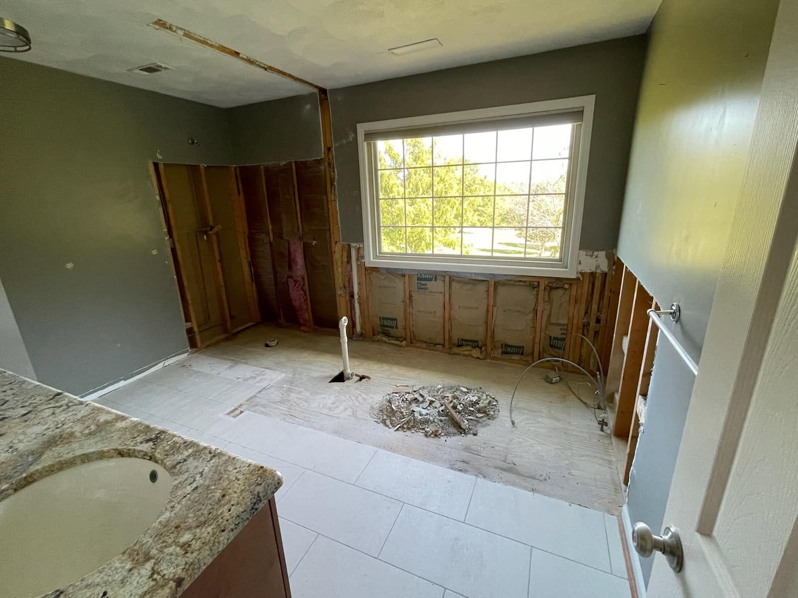 Primary bathroom during demolition
