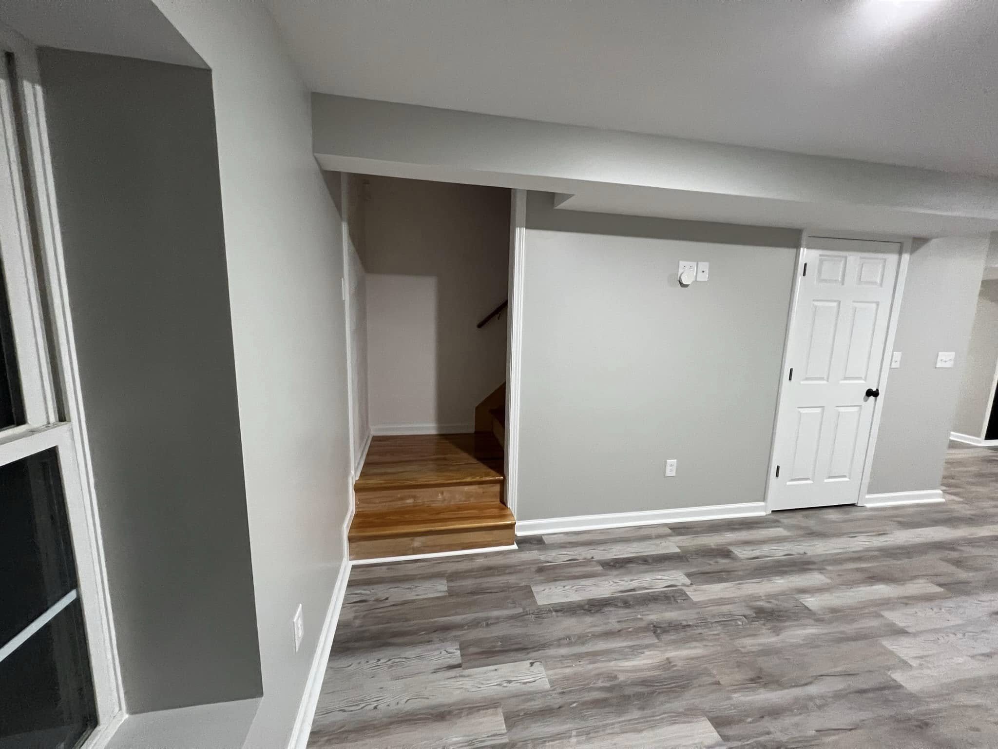 Finished basement recreation room with built-in storage and
entertainment area