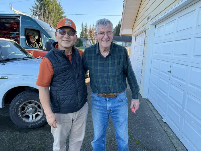 Park's Rooter & Drains technician with a happy customer