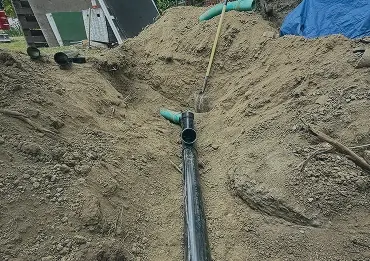 Technician working on interior water lines