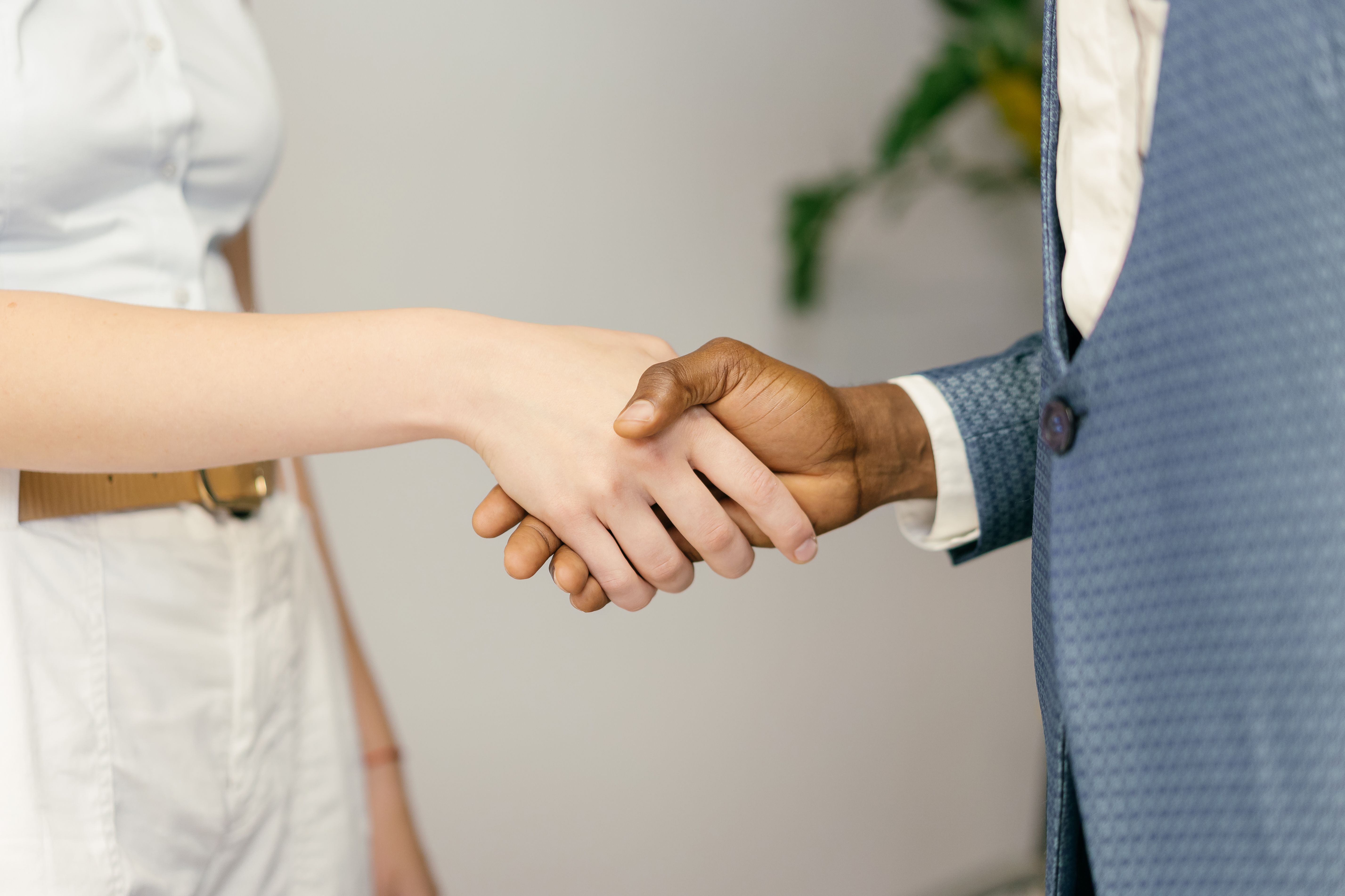 Handshake closing a land sale agreement