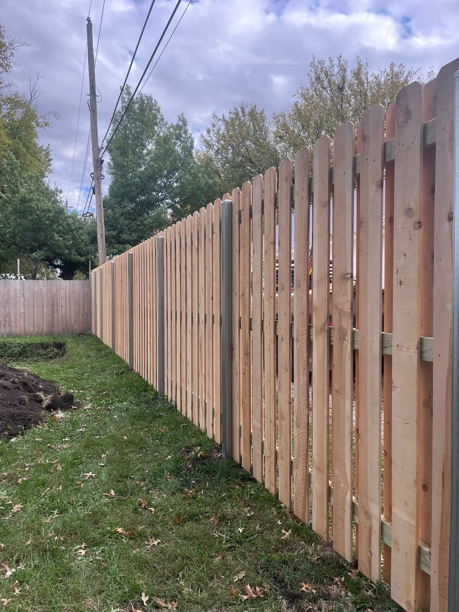 Cedar shadowbox commercial perimeter fence Lincoln NE