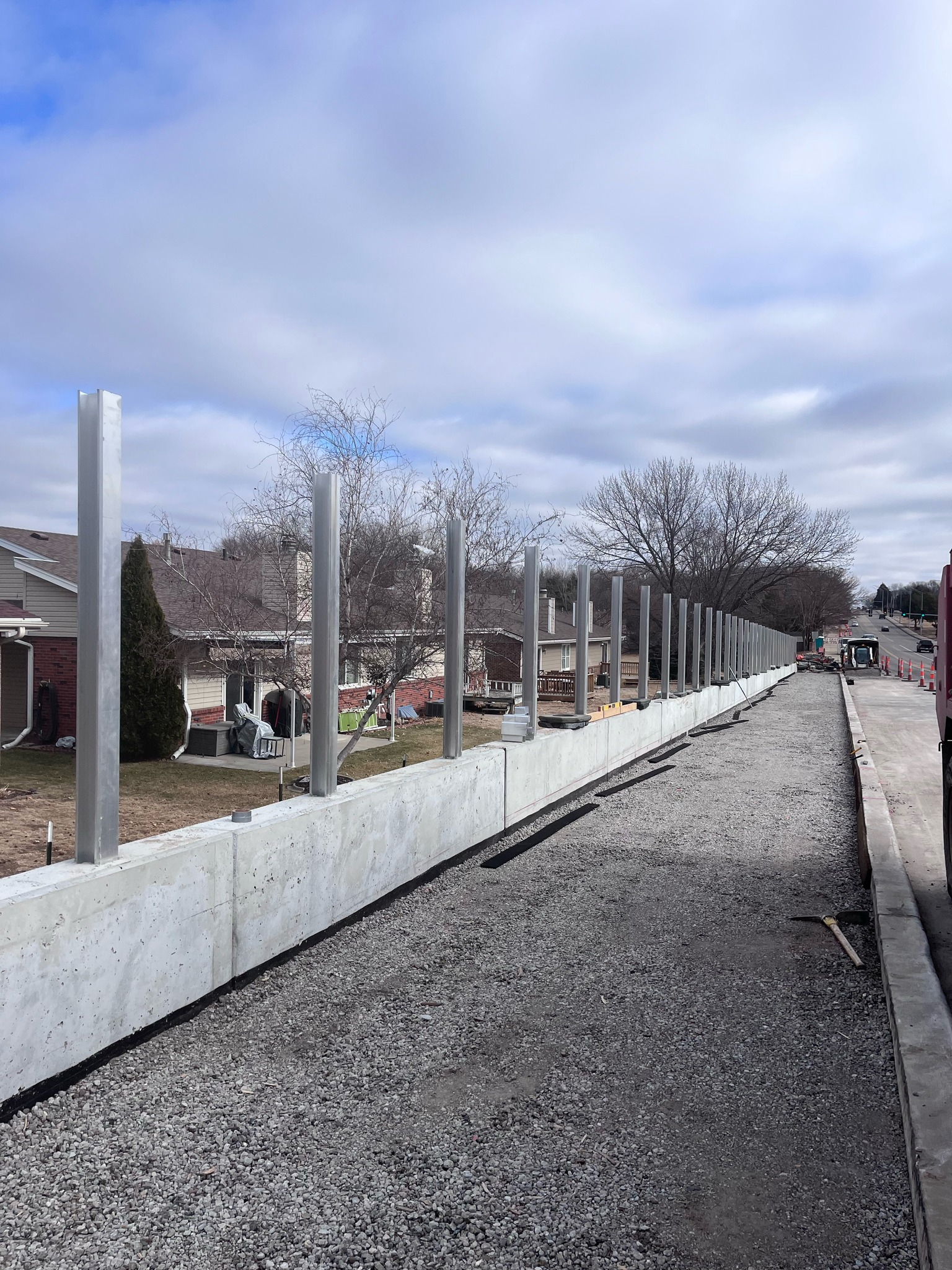 Commercial steel fence post installation in Lincoln Nebraska along major roadway