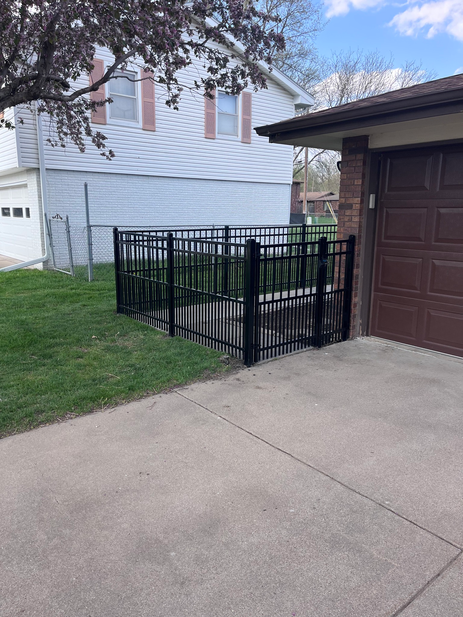 Black aluminum commercial fence installation Lincoln NE Rio Fence Co