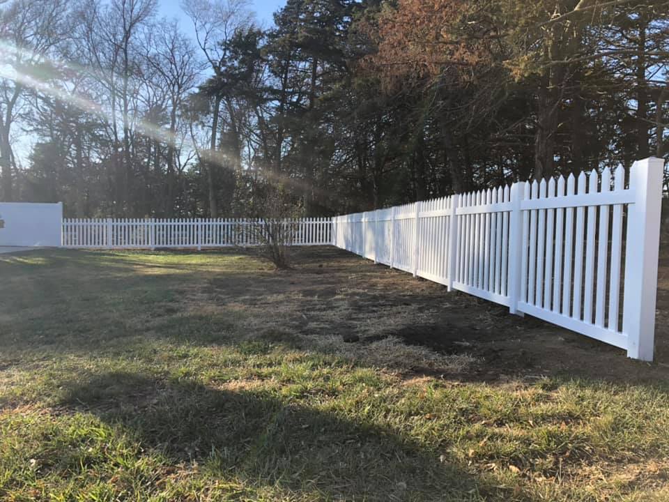 White vinyl picket fence residential installation by Rio Fence Co in Lincoln Nebraska