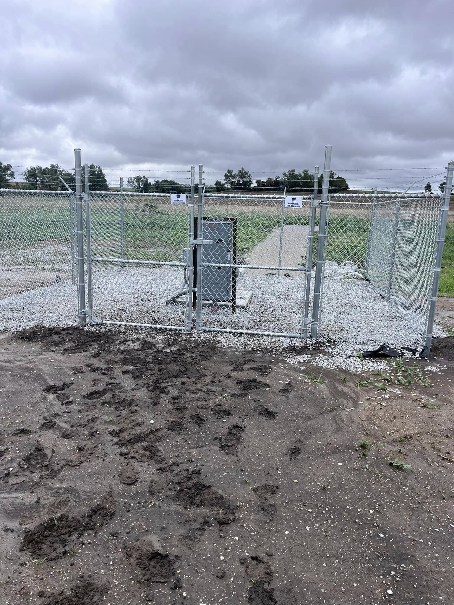 Commercial chain-link fence with 3-strand barbed wire top Lincoln NE Rio Fence Co