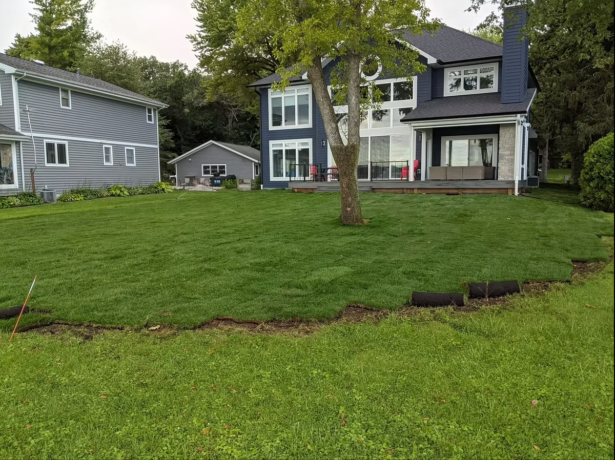 Sod placement near home foundation