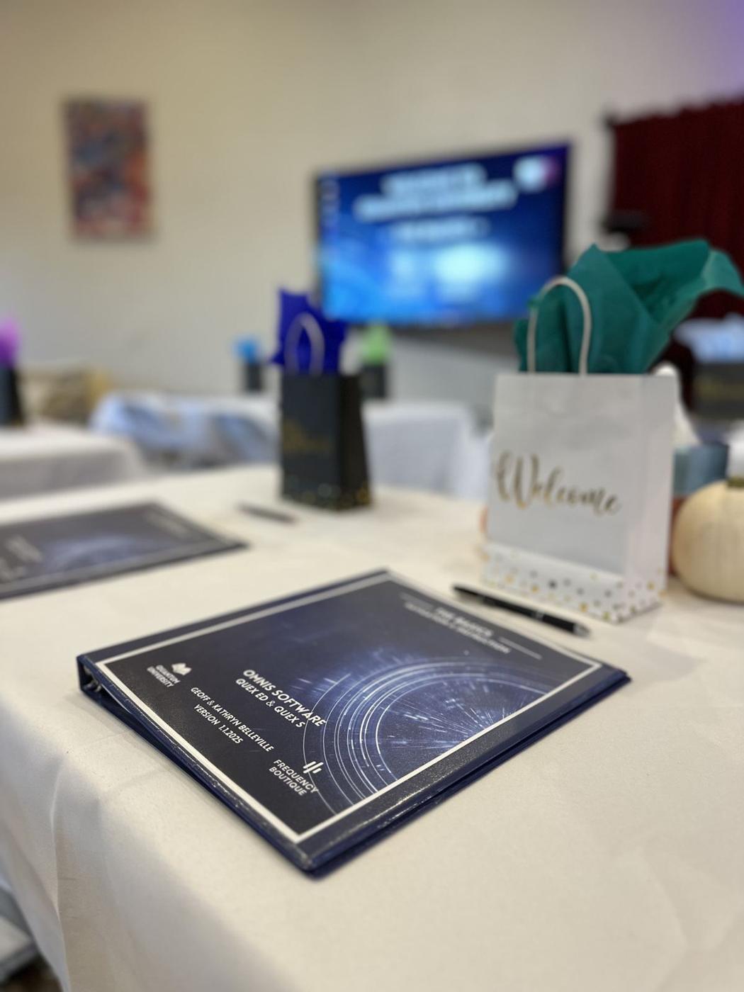 Training manuals laid out at the welcome table